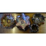 A collection of carnival glass comprising six fluted bowls and two footed bowls (8) Condition Report