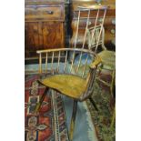 A provincial 18th century elm comb back armchair raised on turned legs Condition Report Original