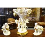 A Victorian Moore Bros porcelain centrepiece modelled as an ornate leaf shaped bowl supported on a