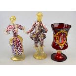 A pair of Venetian glass figures in 18th century style costumes, 22.4 cm h. to/w a Venetian ruby