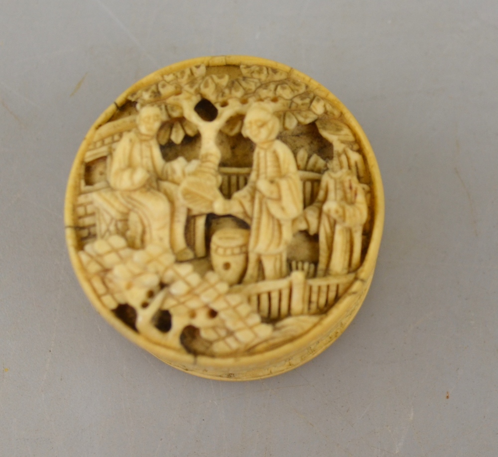 A Chinese Canton ivory pill box, 19th century, carved with figures on a terrace with pine trees, 3. - Image 2 of 4