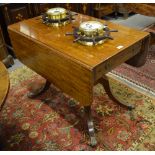 A Victorian mahogany centre/occasional table, the rectangular top with rounded corner drop leaves