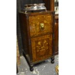 A 19th century marquetry cabinet having a hinged fall front over a cupboard, raised on turned feet,