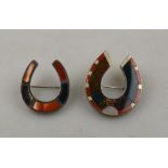 Two Victorian horse shoe brooches set with vari-coloured agate (one showing crack)