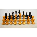 A Staunton turned wood chess set, the rooks stamped with a crown, in mahogany box, King 9 cm, to/w a