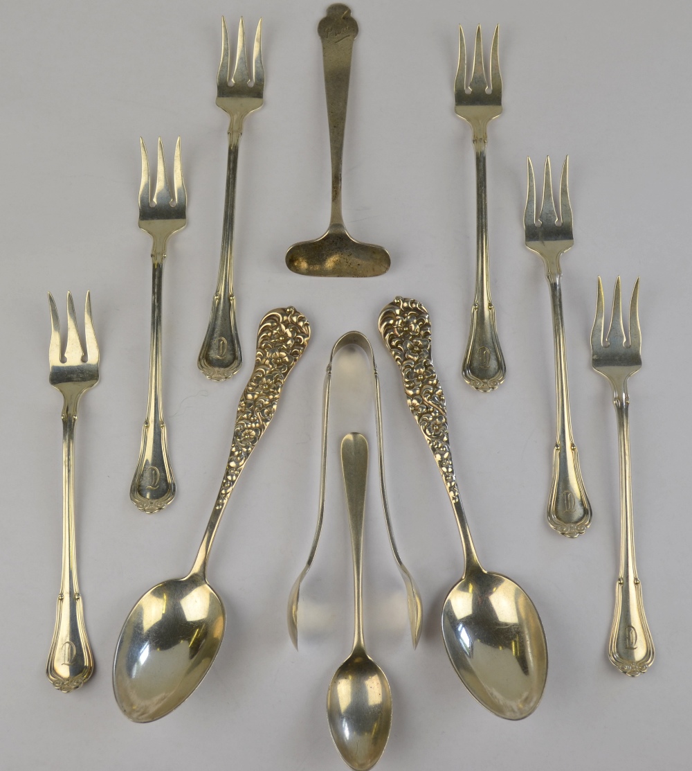 A set of six US sterling pickle forks, to/w a pair of sterling teaspoons, a pair of sugar tongs,