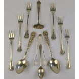 A set of six US sterling pickle forks, to/w a pair of sterling teaspoons, a pair of sugar tongs,