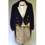 A vintage Bullingdon Club dark blue tailcoat with ribbed cream silk revere and cream silk lining,