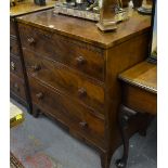 A 19th century mahogany chest of three long graduated drawers raised on splayed bracket feet united