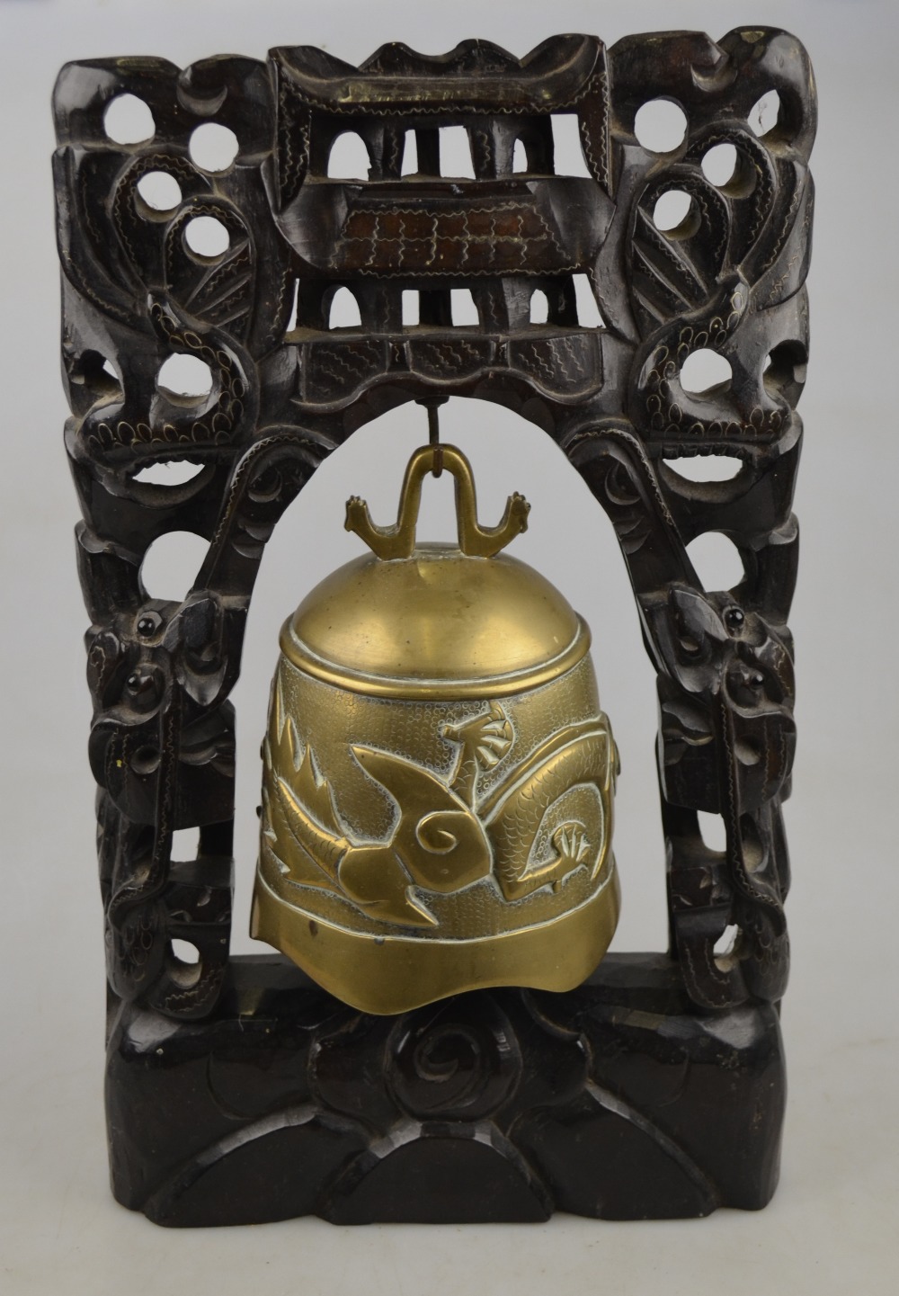 A Chinese brass Chung with carved hardwood support inlaid with silver wire, 19th century, 36.5 cm