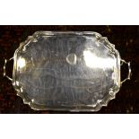 A heavy quality two-handled silver tray with canted corners and moulded rim, C. S.