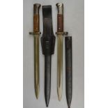 Two WWII Mauser tgf bayonets with 30 cm fullered blades,