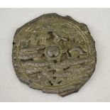A Japanese white metal mirror cast with a central tortoise surrounded by storks and other long life