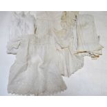 A collection of Victorian infant's cotton nightdresses, petticoats and dresses,