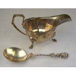 An unusual Victorian silver serving spoon in the Continental manner,