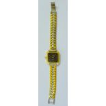 A lady's 9ct gold Longines wristwatch with quartz movement and 2-colour electroplated bracelet