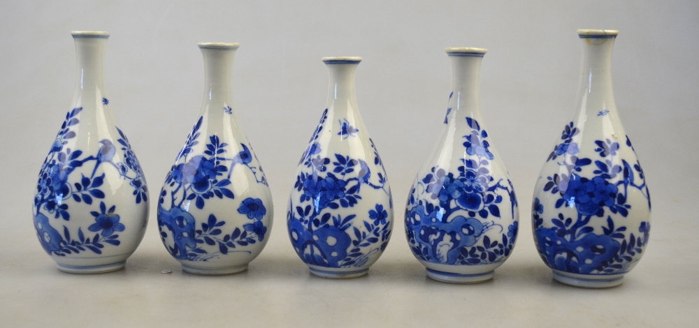 Five Chinese blue and white small pear-shaped vases decorated with flowers, birds, insects and