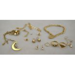 A quantity of 9ct and other gold items including bracelet, crescent pendant,