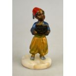 A Bergman-type cold-painted bronze figure of a young boy wearing a fez,