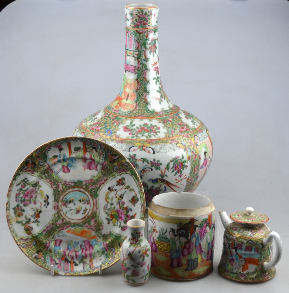 A Chinese Canton famille rose bottle vase, 33 cm h. to/w a similar small teapot, cylindrical jar,