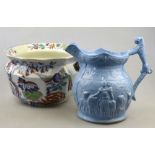 A Staffordshire relief moulded jug, blue ground, depicting Isaac Van Amburgh,