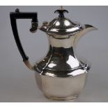 An epns four-piece tea service including hot water jug