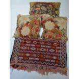 A red ground Turkish runner with geometric pattern and diamond border,