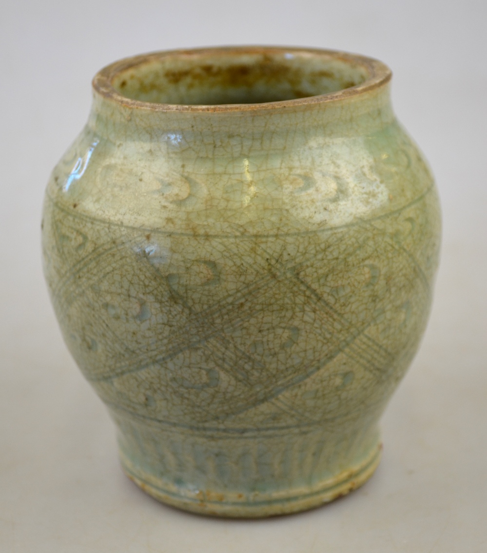 A Chinese celadon small jar incised with a geometric pattern Song/Yuan dynasty, circa 13th - Image 2 of 3