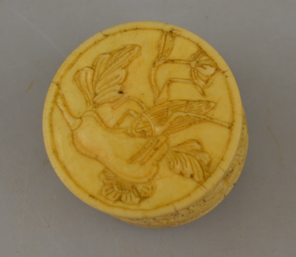 A Chinese Canton ivory pill box, 19th century, carved with figures on a terrace with pine trees, 3. - Image 3 of 4