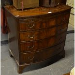 A small Victorian mahogany bowfront chest having a full width brush slide over four long graduated