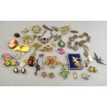 A collection of vintage paste items including brooches, pendants, earrings etc,