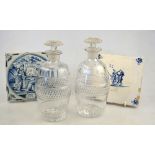 A pair of regency ovoid cordial decanters with mushroom stoppers, 19 cm and two Dutch Delft tiles,