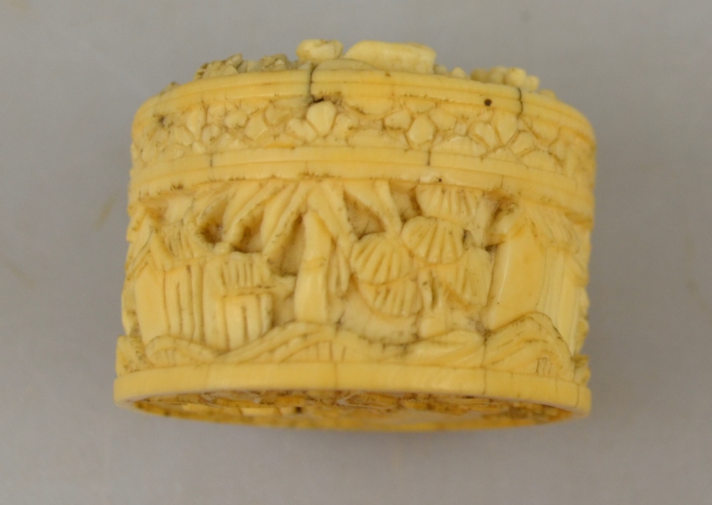 A Chinese Canton ivory pill box, 19th century, carved with figures on a terrace with pine trees, 3. - Image 4 of 4