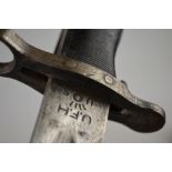 A WWII US UFH bayonet with 25 cm double edged and fullered blade,