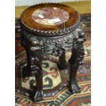 A Chinese hardwood small marble inset pot stand raised on ball and claw feet, 31 cm h.