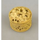 A Chinese Canton ivory pill box, 19th century, carved with figures on a terrace with pine trees, 3.