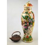 A Chinese famille rose crackleware baluster vase and cover decorated with warriors on horseback and