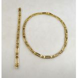 A matching yellow and white 9ct gold rectangular linked necklace and bracelet,