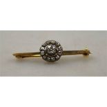 A Victorian bar brooch circular diamond set cluster having square old cut diamond in centre,