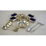 A set of four late Victorian half-reeded open salts with blue glass liners, to/w a matching mustard,
