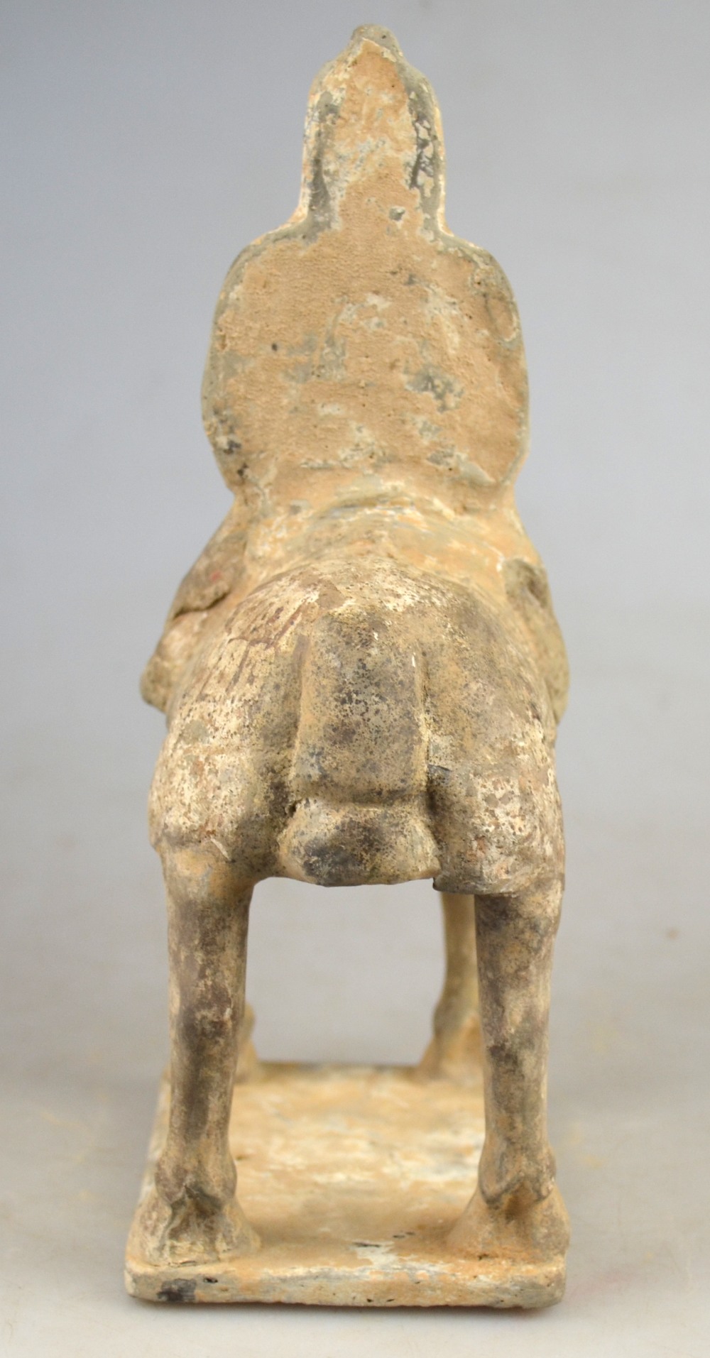 Chinese 6th century AD - a pottery funerary figure of a warrior on horseback. 24 cm Condition Report - Image 4 of 10