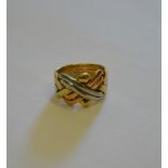 A six row three-coloured gold puzzle ring, 9ct gold, approx. 8.