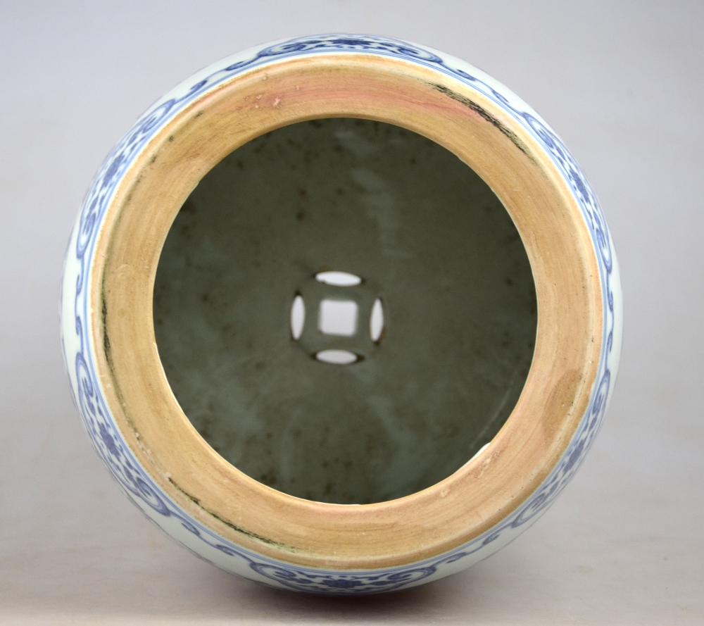 A Chinese blue and white small barrel garden seat decorated with a continuous floral and foliate - Image 5 of 5