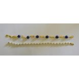 A freshwater pearl bracelet to/w a blue bead and yellow metal bracelet (2)