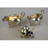 Two silver sauce-boats, London 1923 and Birmingham 1965, to/w an ovoid cruet with blue glass liners,