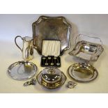 An electroplated fruit basket and matching square salver with engraved decoration,