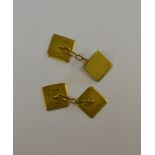 A pair of square engine-turned 9ct chain linked cufflinks, 5.