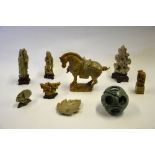 A small collection of 19th/20th century Chinese carved soapstone including a seal carved with