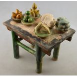 Chinese early Ming Dynasty - a pottery funerary rectangular table, Sancai glazed, 26 x 16.