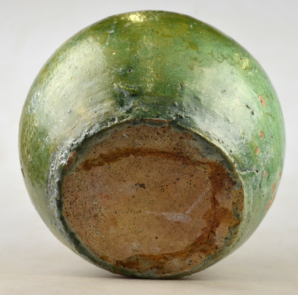 Chinese 11/12th century - a green glazed squat ovoid vase, 18 cm h. Condition Report  Crack to the - Image 4 of 4
